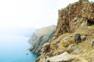 Rocky coast of the sea on a sunny hot day