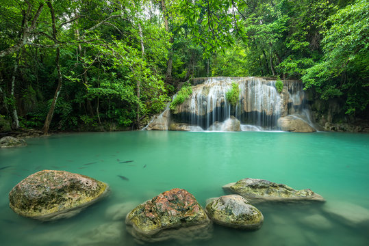 Fototapeta Breathtaking green waterfall at deep forest, Erawan waterfall located Kanchanaburi Province, Thailand