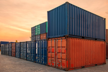 Fototapeta premium container ship in import export and business logistic.By crane , Trade Port , Shipping.Tugboat assisting cargo to harbor.