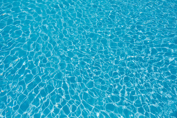 Beautiful ripple wave and blue water surface in swimming pool