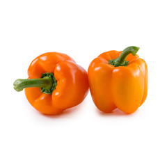 Two orange pepper on isolated background