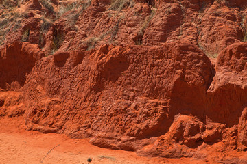 Red canyon with scrawled writing people. Vietnam, MUI Ne