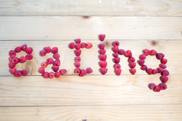 Written Eating, with raspberry