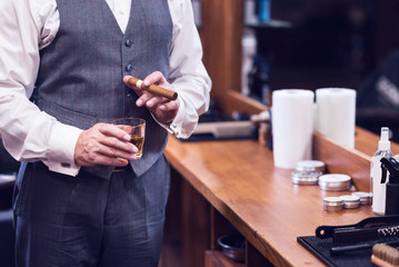 Fototapeta premium Nice handsome man enjoying his whisky