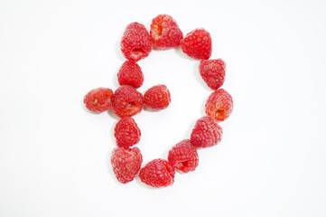 Alphabetical letter Đ made of raspberries on a white background