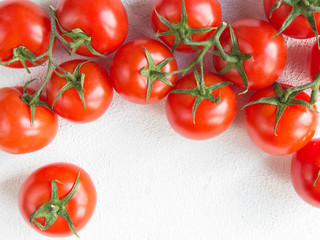 Fresh juicy vegetables tomato pattern and light background with copy space