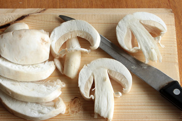 mushrooms on wooden background