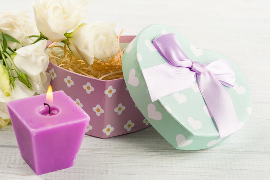 Arrangement of flowers, pastel gift box
