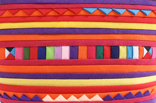 Colorful fabric texture background. Inspiration from tribal pattern. Popular souvenir.