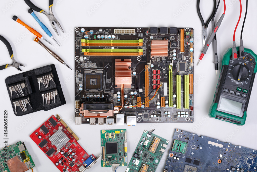 Poster computer upgrade. motherboard and tools flat lay