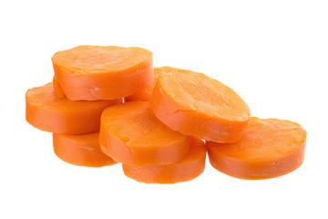 fresh carrots with slices of carrot on the white background