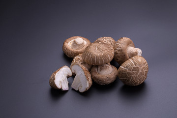 Shiitake mushrooms on a black table