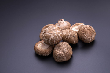 Shiitake mushrooms on a black table