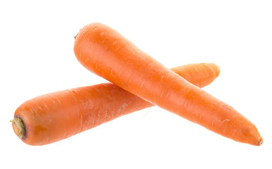 fresh carrots with slices of carrot on the white background