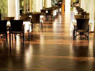 close up outdoor restaurant tables and chairs