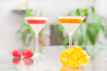 Panna cotta dessert with fruit jelly.