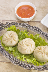 Traditional Dumpling Momos Served With Tomato Sauce
