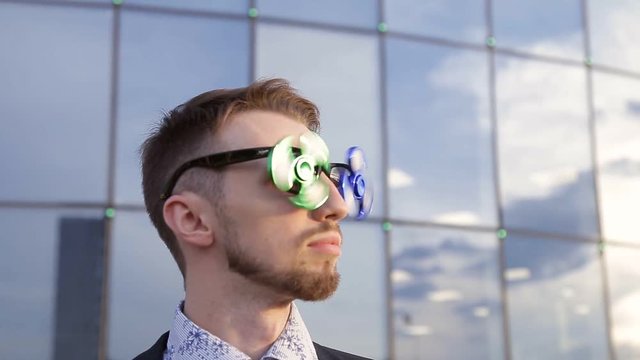 younge man with the spinner glasses