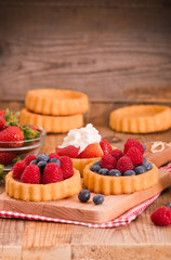 Tartlets with forest fruits. 