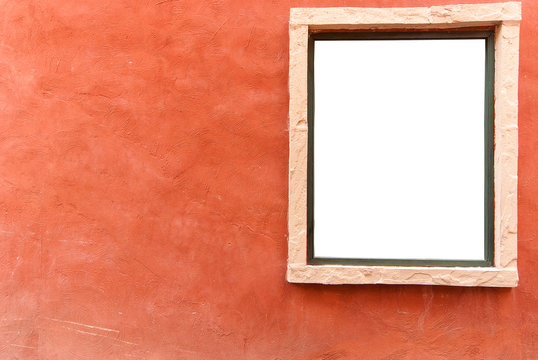 Old orange concrete wall background with white window