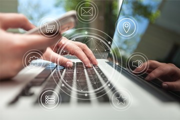 Man with phone and digital tablet.