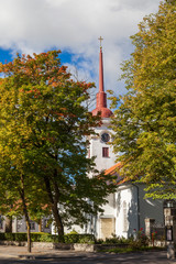 Obraz premium Lutheran church in Kuressarae, Saaremaa, Estonia. Early autumn sunny day.