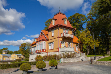 Fototapeta na wymiar Cosy old wooden house (luxury hotel) near Kuressaare castle. A view of Saaremaa island, Estonia.