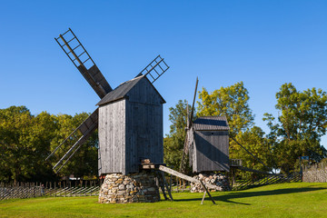 Traditional wooden windmills of Saaremaa island, Estonia. Sunny autumn day.