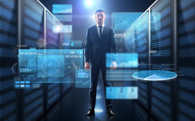 businessman with charts on virtual screen
