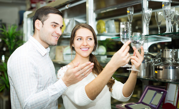 Couple looking at glassware