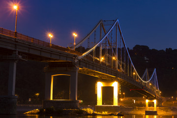 Fototapeta na wymiar Bridge and night embankment, romantic place