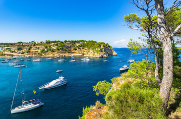Fototapeta na wymiar Mediterranean Sea Coast Spain Majorca beautiful bay with boats yachts in Portals Vells