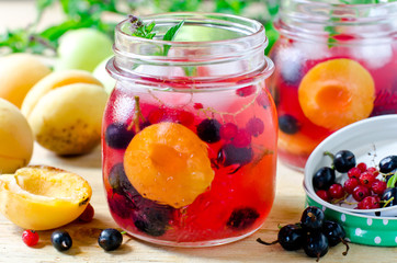 Sangria from apricots, apples and berries