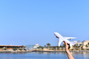 Airplane model in female hand
