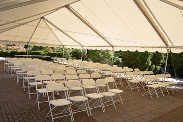 Event tent ceremony seating inside tent.