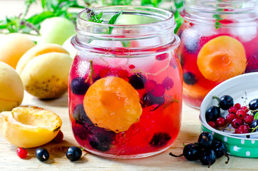 Sangria from apricots, apples and berries