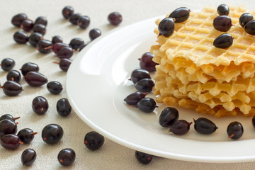 Liege waffles with berries on a napkin