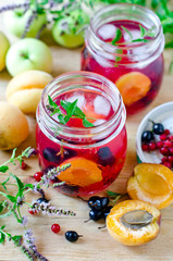 Sangria from apricots, apples and berries