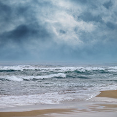 seascape image of stormy day on beach