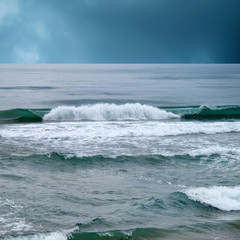 seascape image of stormy day on beach