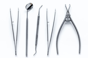 dental tools on white background top view