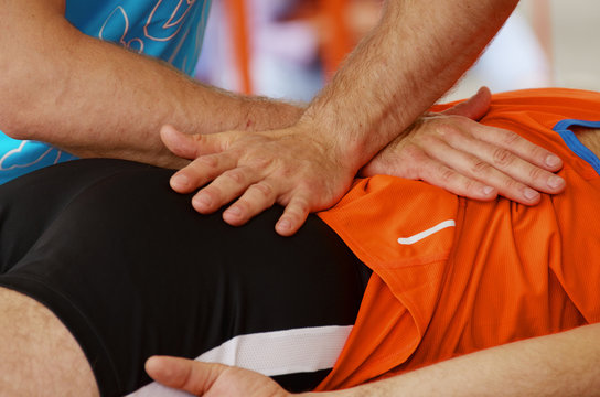 Sports massage therapists work.