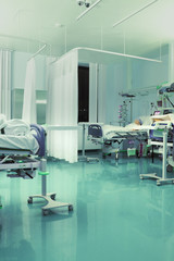 Interior of hospital ward with patients in beds