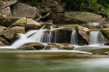 Obraz premium background landscape with waterfall in Yaremche vilage in Ukraine
