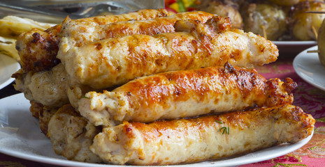 Traditional food. Smoked sausages meat hanging in domestic smokehouse