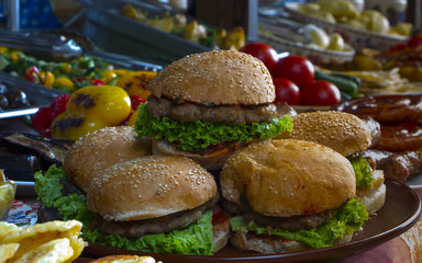 ome made hamburger with lettuce and cheese