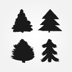 Set of abstract silhouettes of Christmas trees painted with a rough brush. Grunge, sketch, ink, paint, watercolor. Four isolated symbols, signs, logos, icons.