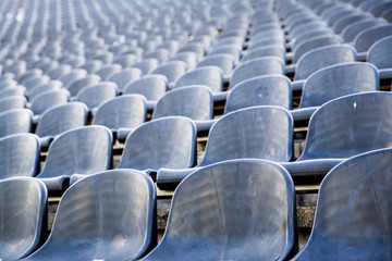 Fototapeta premium Empty tribune with black seat on soccer sdadion