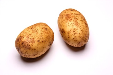 Fototapeta premium New potato isolated on white background close up