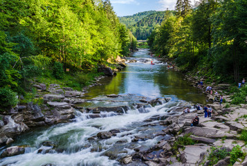 Fototapeta premium background landscape with waterfall in Yaremche vilage in Ukraine